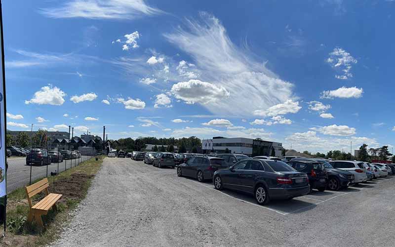 a parking lot with cars parked on it